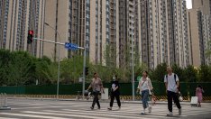 Китайските градове бързат да привлекат купувачи на жилища с бонуси и намалени цени