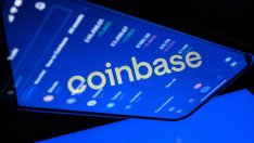 Coinbase намалява загубата и изненада с по-малък спад на приходите