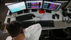 Борсите в Азия завършиха на червено след пониженията на Wall Street
