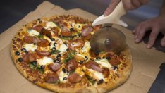 Любовта на Китай към пицата дава нови възможности на производителите на сирена