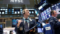 Dow скочи с 567 пункта след търговия с резки колебания