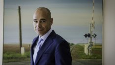 Карл Айкан примами мениджър от General Electric за своя холдинг