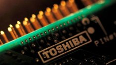 Apple забавя сделката за звеното за чипове на Toshiba?