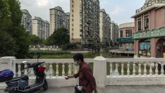 Финансовите неволи на китайския имотен пазар удрят и банките