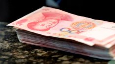 Валутните резерви на Китай се понижават до близо 6-годишен минимум през декември