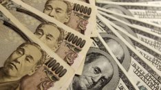 Доларът поевтиня спрямо йената до най-ниската си стойност от ноември 2014 г.