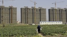 Местните власти в Китай и правителството в спор за жилищния пазар