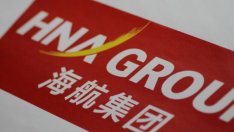 Един от най-големите китайски инвеститори в имоти в чужбина започва да продава