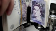 Британската лира достигна едноседмично дъно спрямо долара