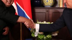 45-минутната среща между Тръмп и Ким