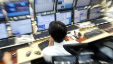 Волатилността на валутните пазари подкрепи рекорд на FTSE 100