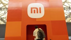 Приходите на Xiaomi спадат, но компанията напредва с плановете си за електромобили