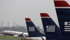 Сливанията на авиокомпании повишиха таксите и цените на билетите