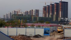 Растежът на инвестициите в имоти се забавя през второто тримесечие в Китай