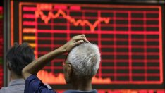 Китайските регулатори премахват системата за прекъсване на борсовата търговия