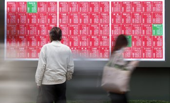 Азиатските пазари затвориха със спадове след последното понижение на лихвите от Фед