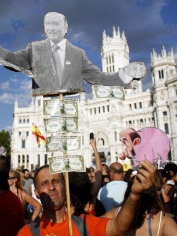 <p>
	<em>Протест срещу мерките за бюджетни икономии в Мадрид, 21 юли 2012 г. Снимка: Ройтерс</em></p>
