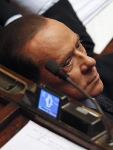 <p>
	Призракът на бившия премиер Силвио Берлускони продължава да витае в италианската политика. <em>Снимка: Ройтерс</em></p>
