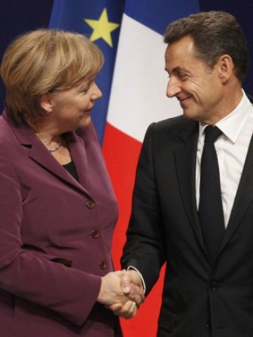 <p>
	Ангела Меркел и Никола Саркози по време на съвместната им пресконференция след срещата с Георгиос Папандреу. Снимка: Ройтерс</p>
