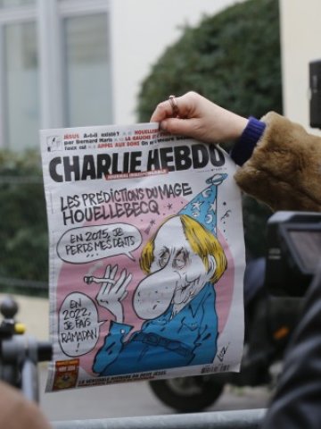 <p>
	Корицата на последния брой на сатиричното издание. <em>Снимка: Ройтерс</em></p>
