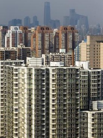 <p>
	Нискобюджетни жилища в Пекин. <em>Снимка: БТА</em></p>
