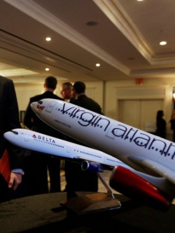 <p>
	<em>&nbsp;</em>Двете авикомпании ще споделят и разходи при маршрутите между Великобритания и Северна Америка. <em>Снимка: Ройтерс</em></p>
