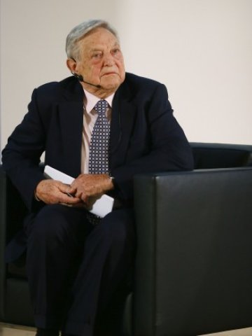 <p>
	Джордж Сорос: Германия се колебае да поема отговорност. <em>Снимка: Ройтерс</em></p>
