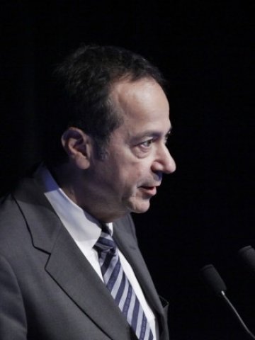 <p>
	Джон Поулсън.<em> Снимка: архив, Ройтерс</em></p>
