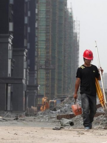 <p>
	Строителна площадка в Китай. <em>Снимка: Ройтерс</em></p>
