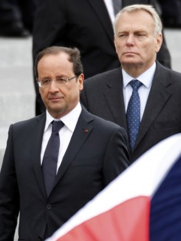 <p>
	Френският президент Франсоа Оланд и премиерът на страната Жан-Марк Еро. <em>Снимка: Ройтерс</em></p>
