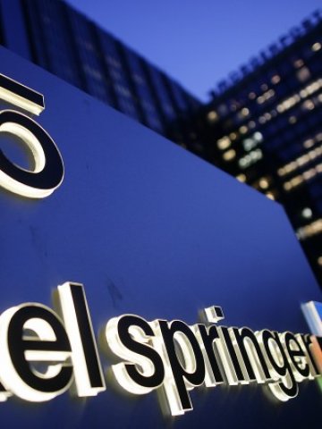 <p>
	Централата на издателството в Берлин. <em>Снимка: Ройтерс</em></p>
