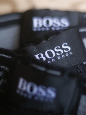 <p>
	Специализираният в мъжката мода концерн се фокусира върху разширяването на своите собствени маркови магазини. <em>Снимка: архив Ройтерс</em></p>
