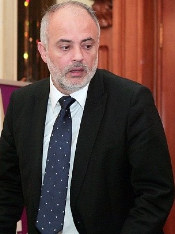 <p>
	<em>Социалният миинистър Тотю Младенов</em> &nbsp; Снимка: БТА</p>
