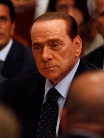 <p>
	Италианският премиер Силвио Берлускони е принуден да ускори реформите<em>. Снимка: Ройтерс</em></p>
