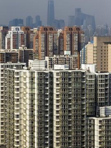 <p>Жилищни сгради в Пекин. <i>Снимка: БТА</i></p>