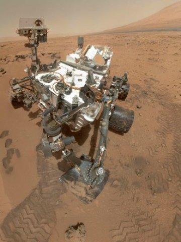<p>
	Марсоходът Curiosity по време на мисията си. <em>Снимка: Ройтерс</em></p>
