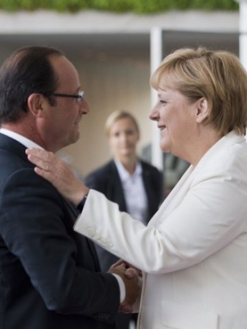 <p>
	<em>Германският канцелр Ангела Меркел и президентът на Франция Франсоа Оланд. Снимка: Ройтерс</em></p>
