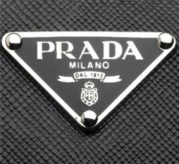 Времето за разплата в Prada малко се отлага 