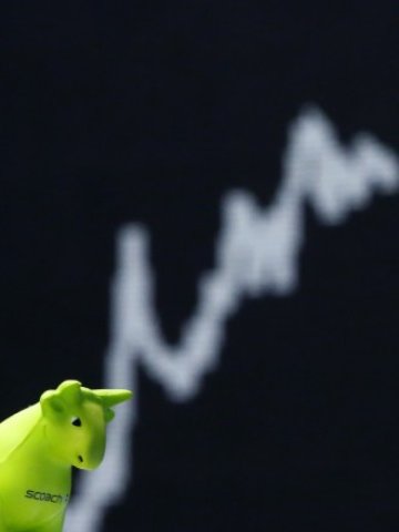 <p>
	Биковете се настаниха на борсата във Франкфурт. <em>Снимка: Ройтерс</em></p>
