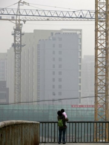 <p>
	Градовете в Китай ще имат нужда от около 700 млн. кв. м нови жилищни площи годишно. <em>Снимка: Ройтерс</em></p>
