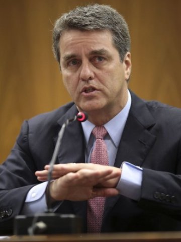 <p>
	Постигането на глобално търговско споразумение ще е победа за новия ръководител на СТО Роберто Алсеведо.<em> Снимка: Ройтерс</em></p>
