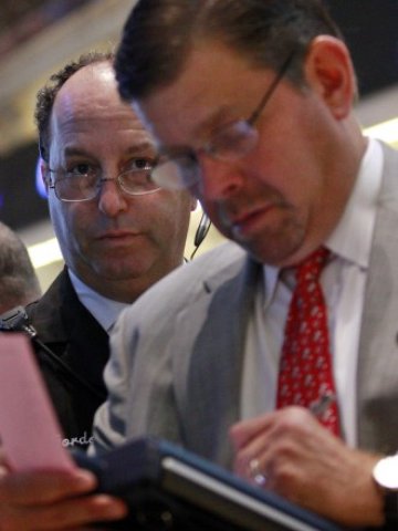 <p>
	Напрежението на Wall Street остава високо. <em>Снимка: Ройтерс</em></p>
