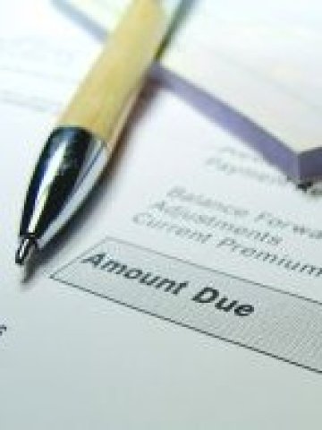 Чековите книжки вече са на изчезване, изместени от кредитните карти. Снимка: sxc.hu