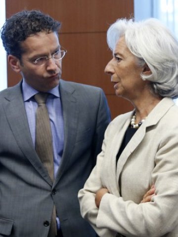 <p>
	Генералният директор на МВФ Кристин Лагард и председателят на Еврогрупата Йерун Диселблум. <em>Снимка: Ройтерс</em></p>
