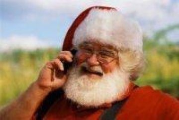 Дядо Коледа ще ни донесе трети GSM оператор. Снимка: Corbis