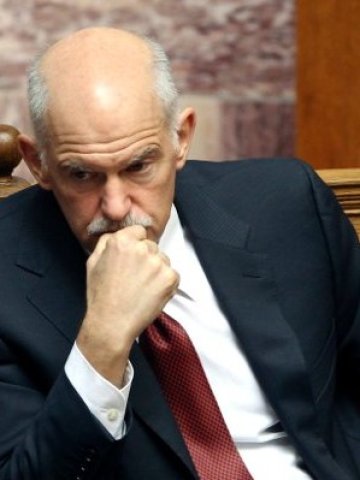 <p>
	Гръцкият премиер Папандреу е замислен по време на последното заседание на парламента. <em>Снимка: Ройтерс</em></p>

