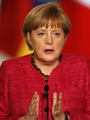 <p>
	Кабинетът на Ангела Меркел успя да балансира публичните разходи на страната. <em>Снимка: Ройтерс</em></p>
