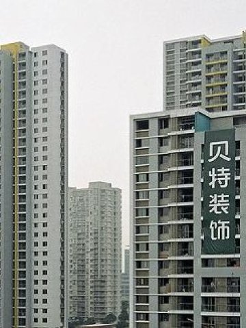 <p>
	Жилищни сгради в Шанхай. Снимка: Herr_Bert, лиценз: <strong><a href="http://creativecommons.org/licenses/by/2.0/" target="_blank">Creative Commons</a></strong></p>
