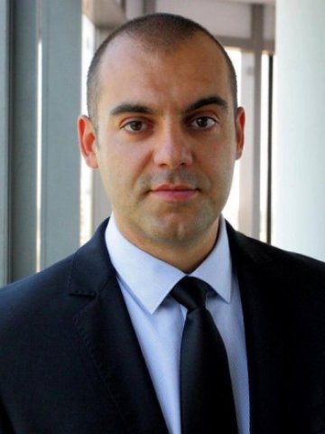 Ангел Келчев, старши мениджър „Сливания и придобивания”, Ърнст и Янг България