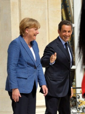 <p>
	Париж и Берлин призовават за&nbsp;залегнал в конституциите на страните от Еврозоната &bdquo;механизъм за спиране на дълговете&ldquo;. <em>Снимка: Ройтерс</em></p>
